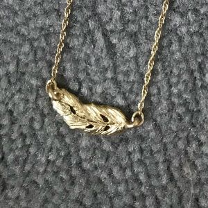 Gold feather necklace